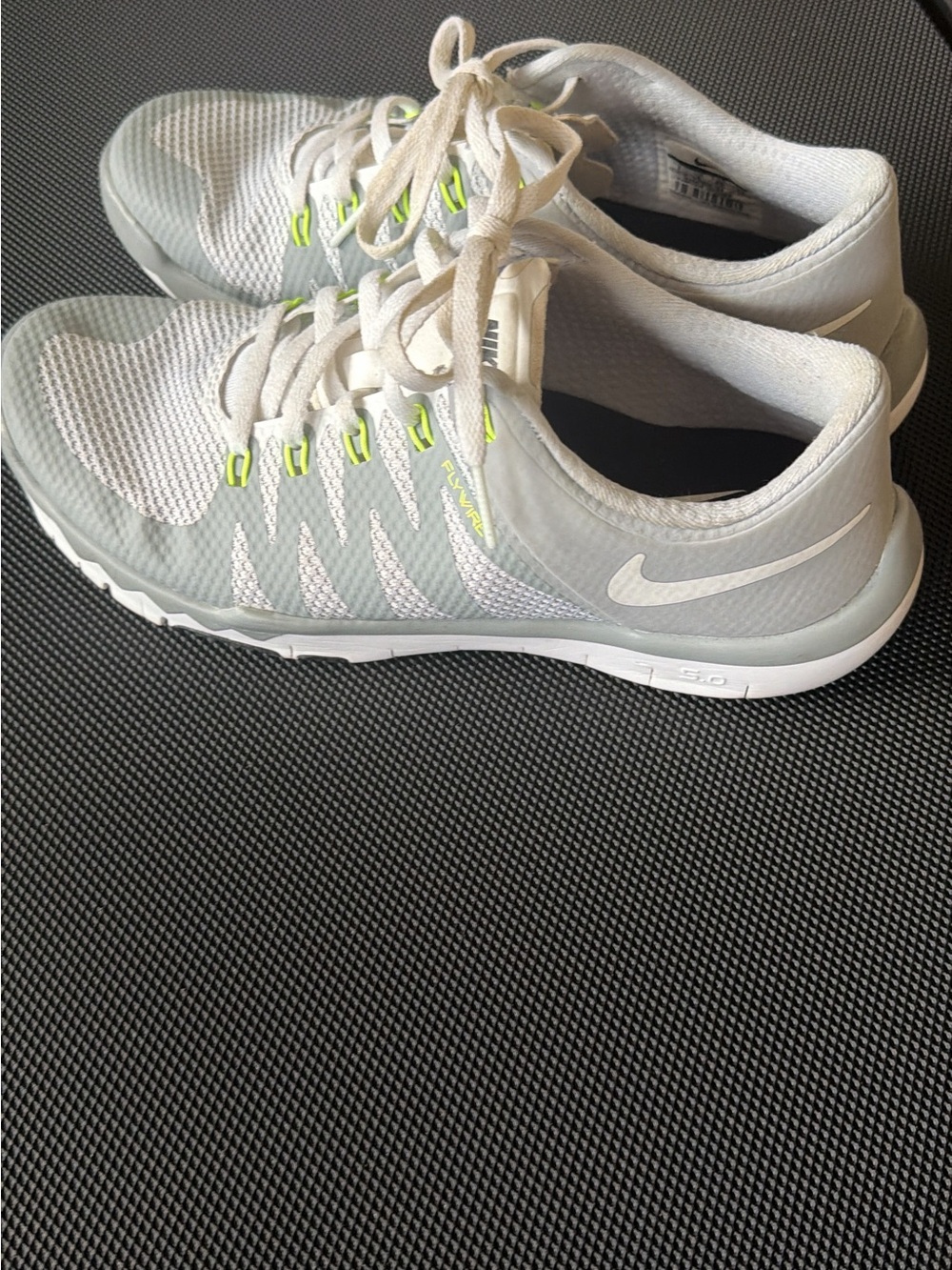 Nike Women’s Light Gray Training Sneakers with Neon Yellow Accents